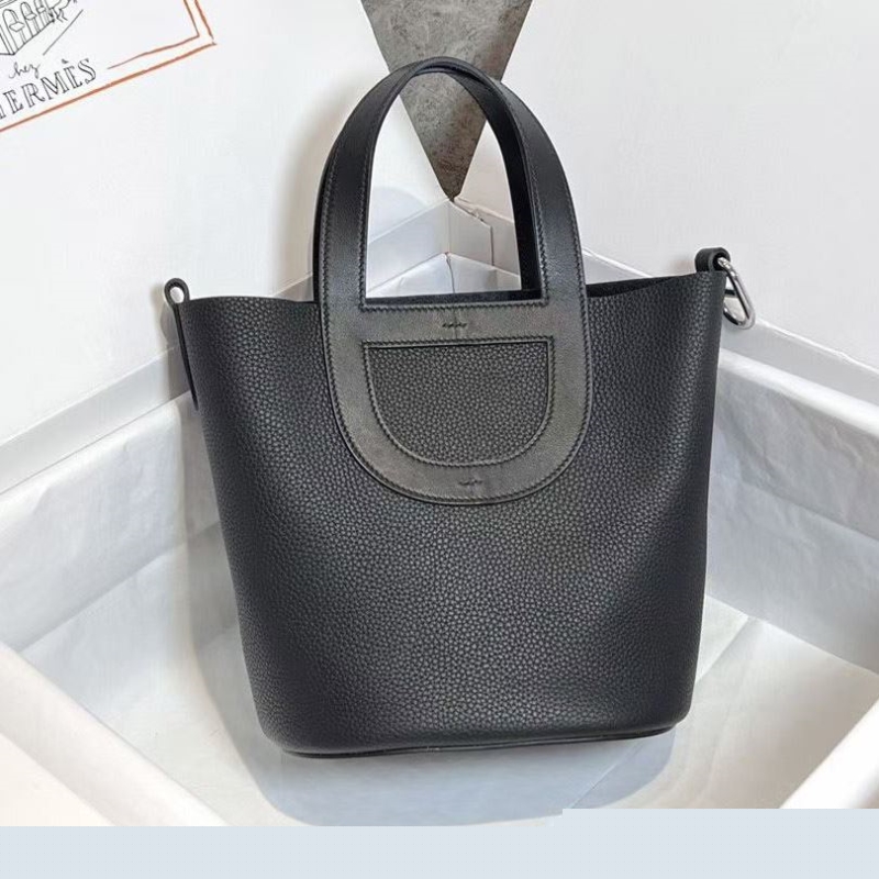 H**mes shopping bags
